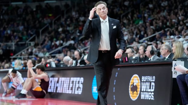 Iona head coach Rick Pitino works the bench in the first half of a first-round college basketball game against Connecticut.